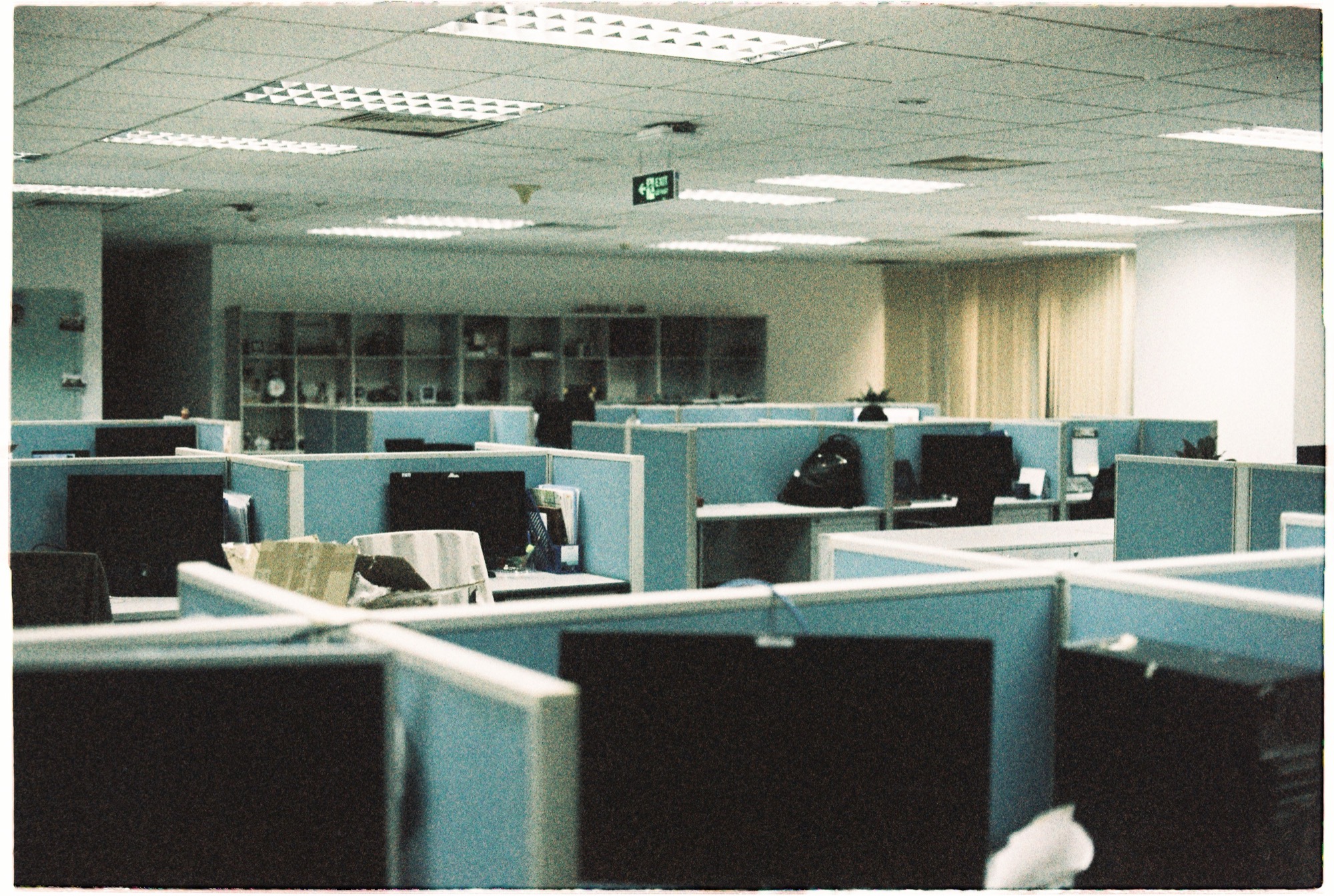 Empty workstation floor after the office has gone quiet